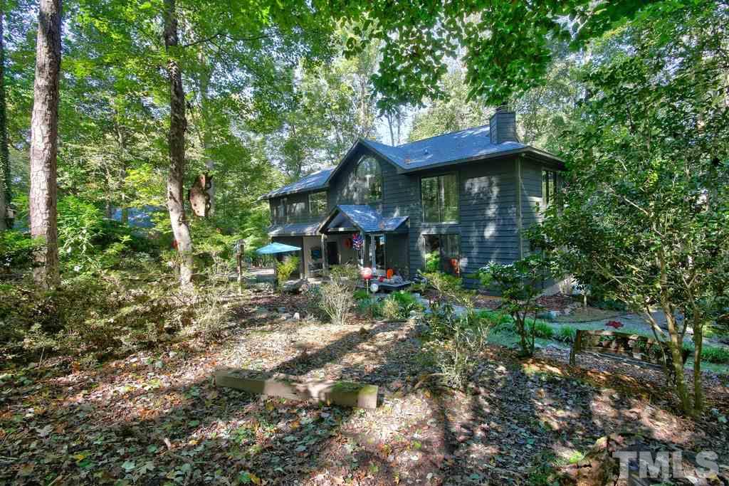 11312 Saddleview Court Raleigh, NC 27613 - Photo 2 of 25 Stunning home sits on a 1.5 acre lot and has been beautifully maintained. Long driveway leads to your serene home & is lined with hard wood trees. Artistic additions throughout the yard including a Koi pond and so much more!