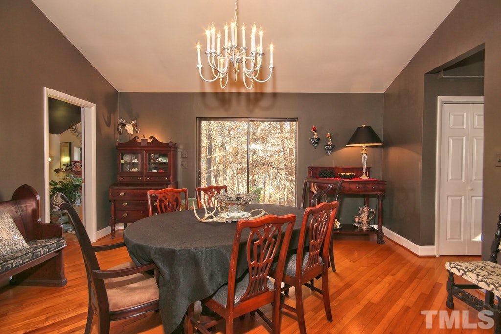 11312 Saddleview Court Raleigh, NC 27613 - Photo 12 of 25 Separate formal dining room to host your family and friends is very large.