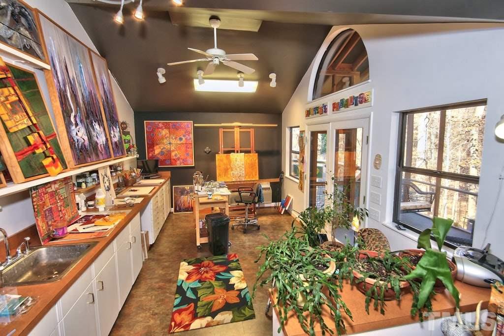 11312 Saddleview Court Raleigh, NC 27613 - Photo 20 of 25 Artists dream studio! If not an artist, use your imagination! Open to the screened in porch. Great for man cave, yoga studio, bonus area and so much more. Be creative and make it your own. Large closet for storage as well.