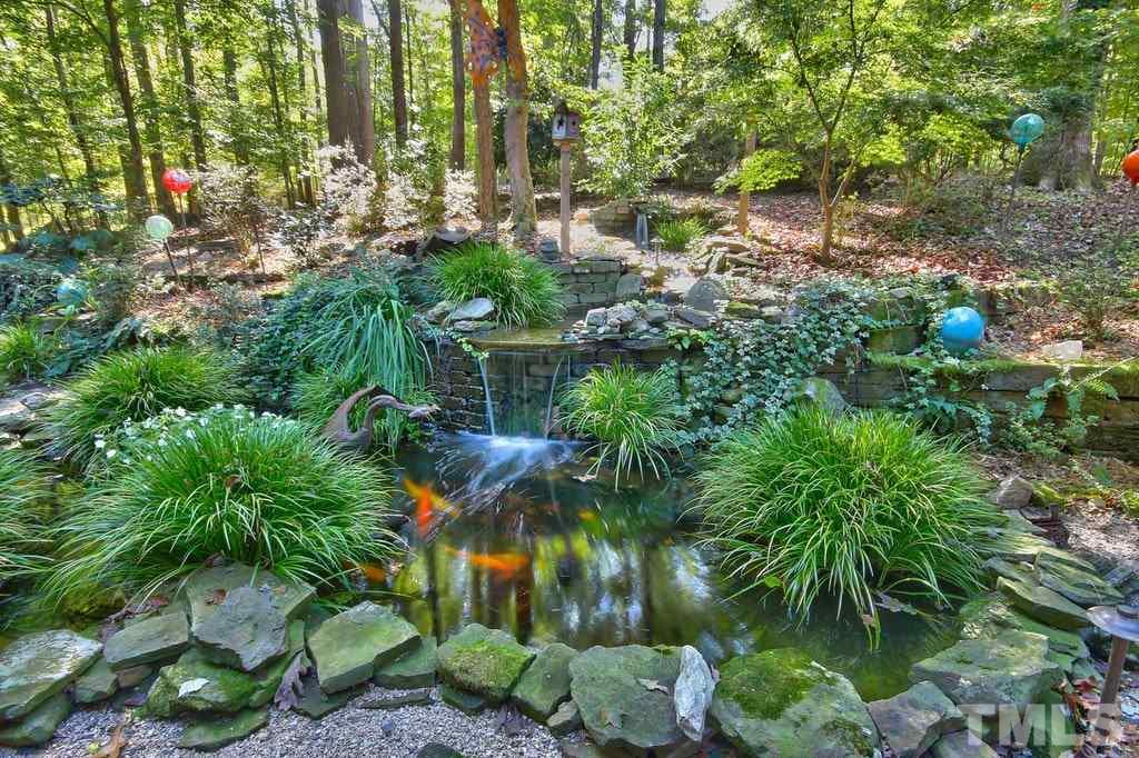 11312 Saddleview Court Raleigh, NC 27613 - Photo 3 of 25 So much care and thought put into this home's landscaping as well as the interior. Current owners wanted the peacefulness of the country while still living in the city and that's what they have obtained here!