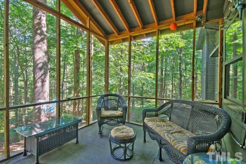 11312 Saddleview Court Raleigh, NC 27613 - Photo 21 of 25 Glorious screened in porch is very comfortable during the many seasons we have in North Carolina and includes carpeting and a ceiling fan.