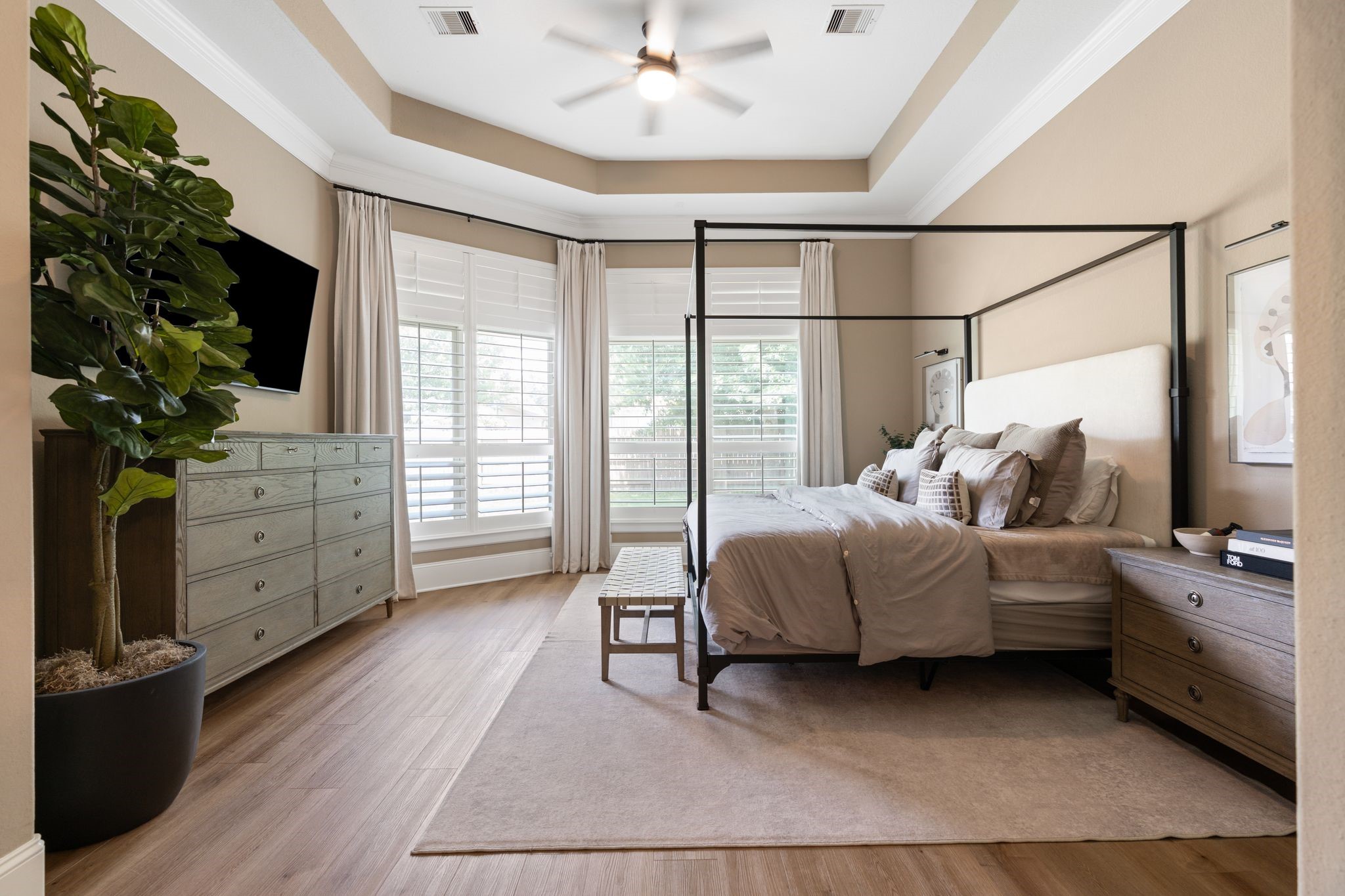 2914 Rutherford Pl Court Katy, TX 77494 - Photo 24 of 50 a bedroom with a bed and a flat tv screen on dresser