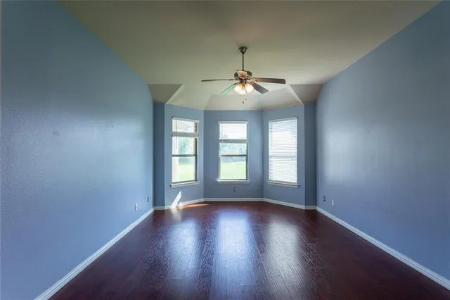 a view of livingroom with window and hardwood floor