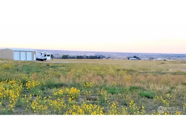 a view of a lake with a mountain in the background