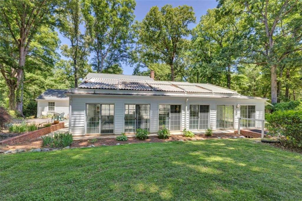 103 Gabriel Way Social Circle, GA 30025 - Photo 58 of 70 a front view of a house with a garden view