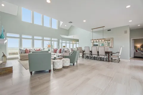 a living room with furniture and a table