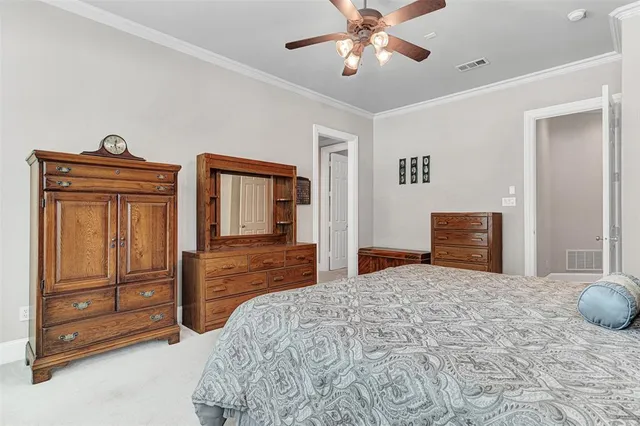 a bathroom with a sink vanity and mirror