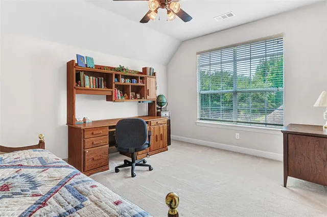 a bathroom with a sink a toilet a mirror a bathtub and shower