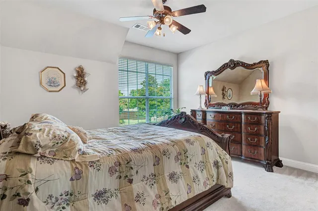 a bathroom with cabinets and a sink