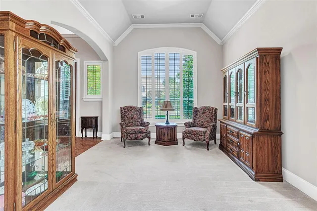 a view of a dining room with furniture window and outside view
