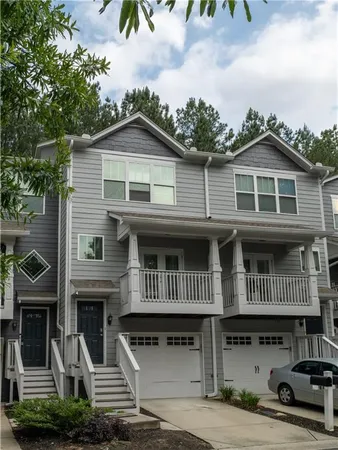 a front view of a house with a deck