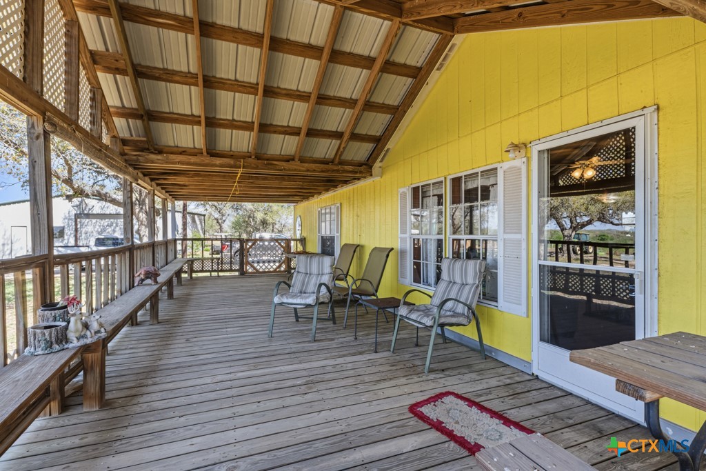 2632 Slickfield Road Yorktown, TX 78164 - Photo 18 of 33 a living room with furniture and wooden floor
