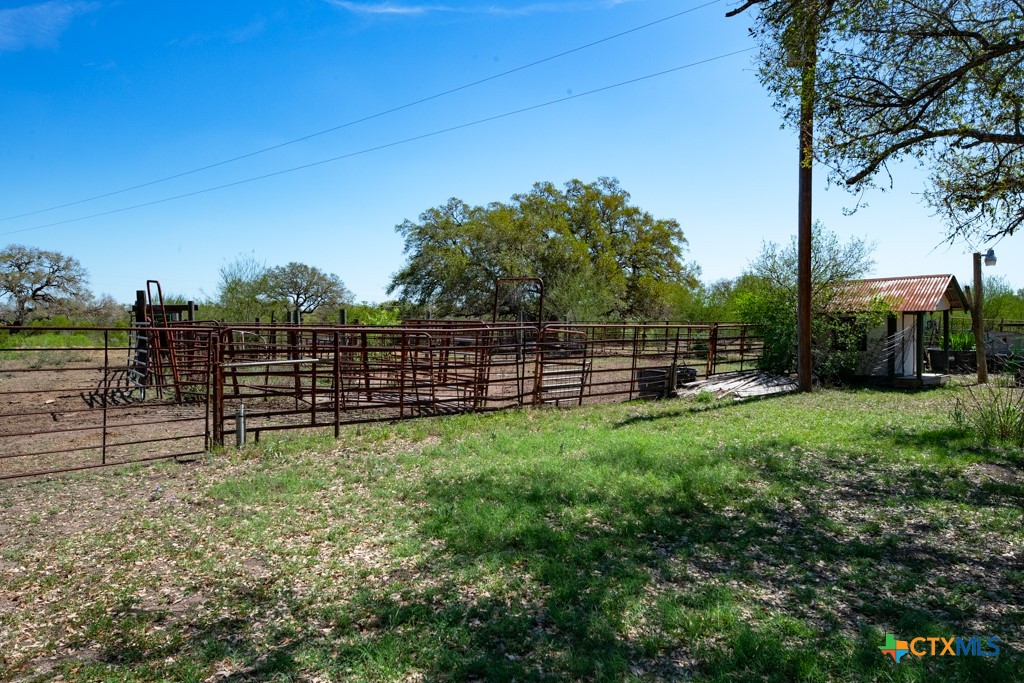 2632 Slickfield Road Yorktown, TX 78164 - Photo 28 of 33 a view of a backyard with a garden
