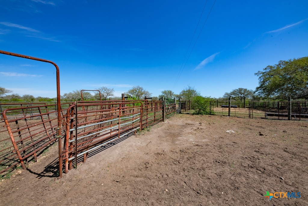 2632 Slickfield Road Yorktown, TX 78164 - Photo 29 of 33 a view of a yard with wooden fence