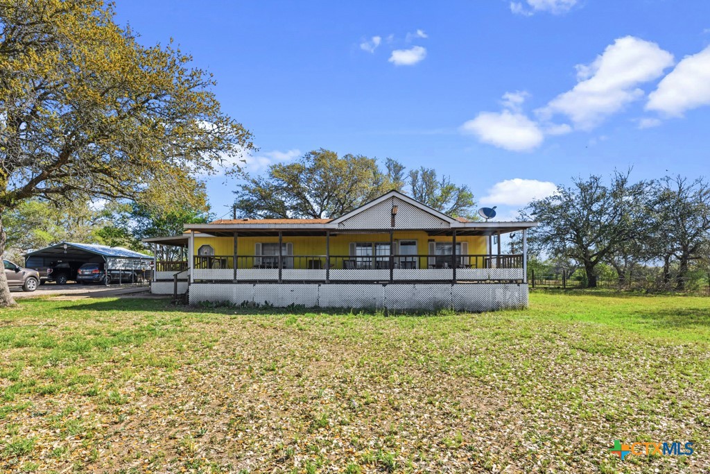 2632 Slickfield Road Yorktown, TX 78164 - Photo 3 of 33 a view of a house with a big yard