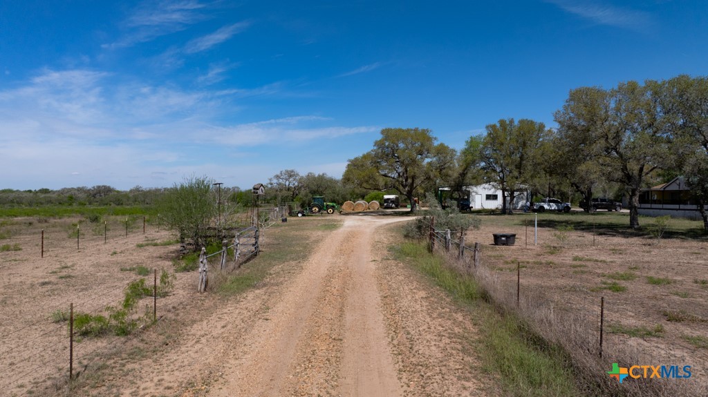 2632 Slickfield Road Yorktown, TX 78164 - Photo 32 of 33 a view of a lake with outdoor space