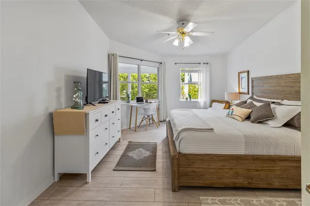 a view of a dining room with a table and chairs