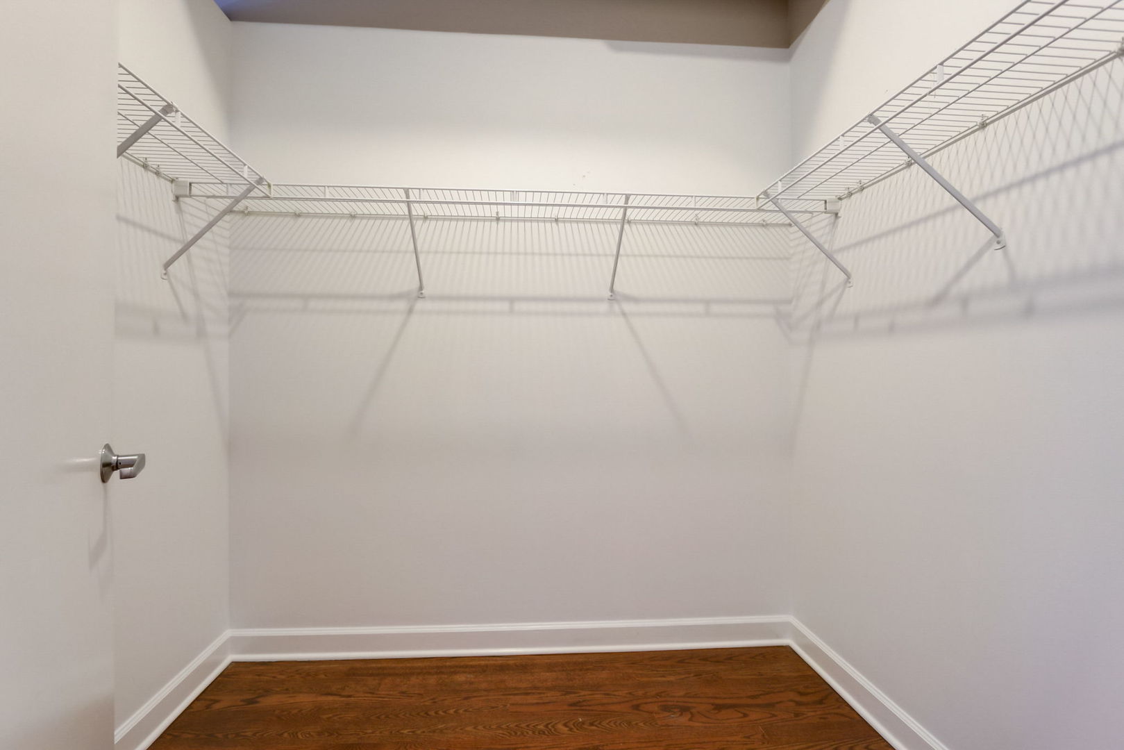 111 South Morgan Street, Unit 505 Chicago, IL 60607 - Photo 15 of 23 a view of a room with racks on the wall