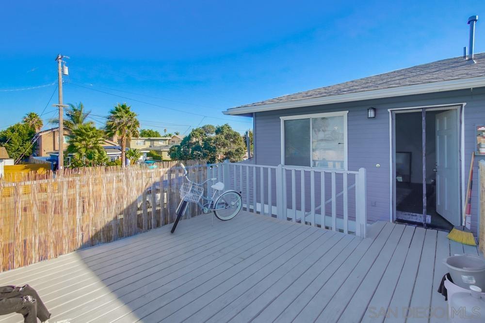 1122 11th Street Imperial Beach, CA 91932 - Photo 17 of 23 a view of a house with a wooden deck