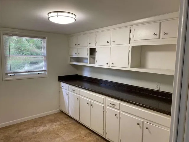 a view of a room with a small window