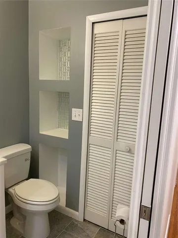 a bathroom with a tub and a shower