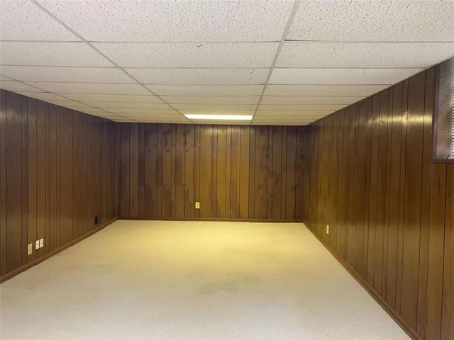 a view of a park with large trees