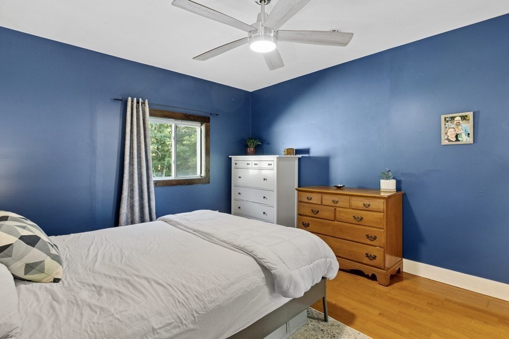 8 Squirrel Road Plymouth, MA 02360 - Photo 24 of 42 a bedroom with a bed and a dresser