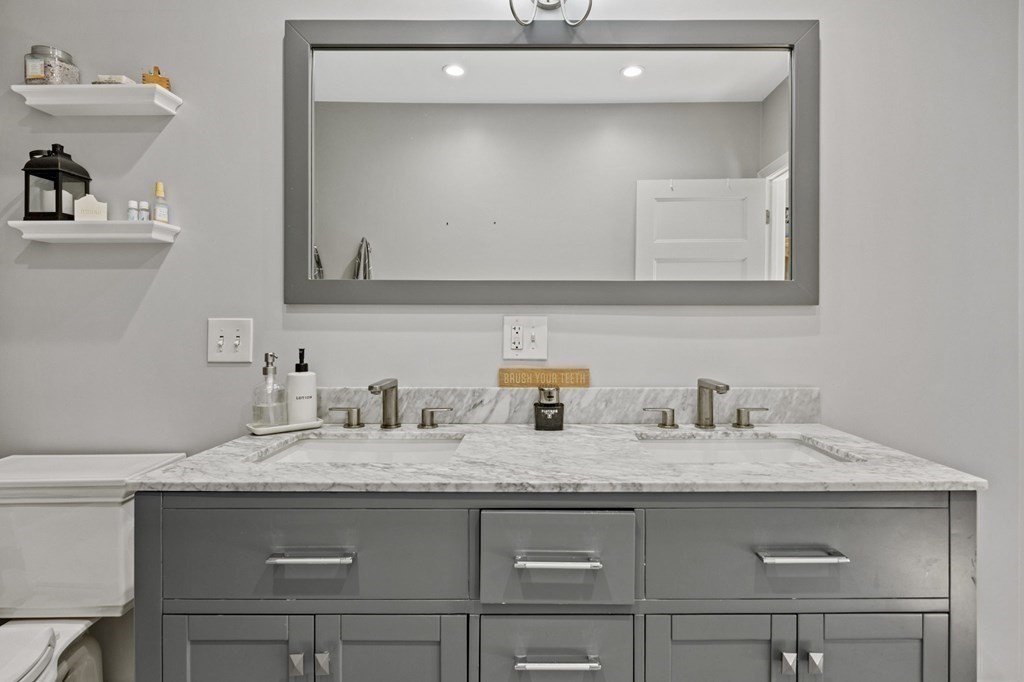 8 Squirrel Road Plymouth, MA 02360 - Photo 27 of 42 a bathroom with sink granite and mirror
