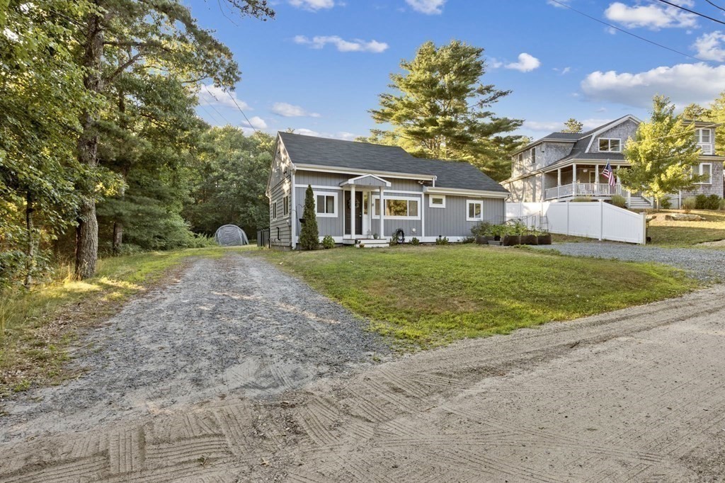 8 Squirrel Road Plymouth, MA 02360 - Photo 3 of 42 a view of a house with a big yard and large trees