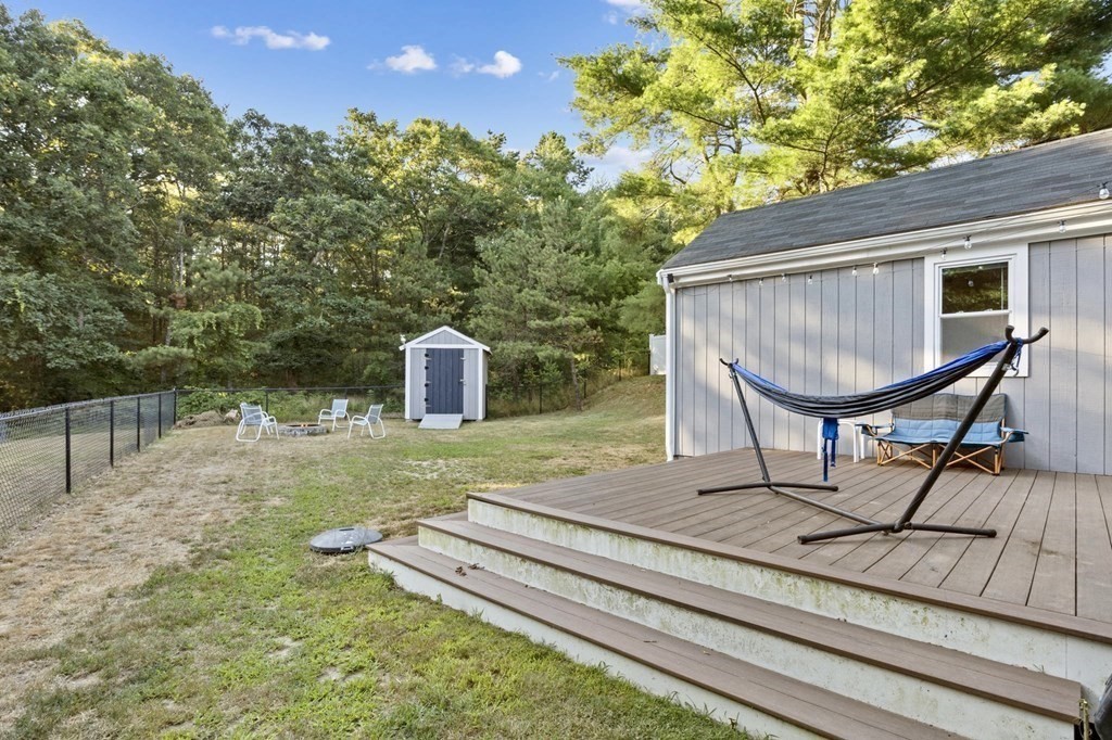 8 Squirrel Road Plymouth, MA 02360 - Photo 39 of 42 a view of a backyard with sitting area