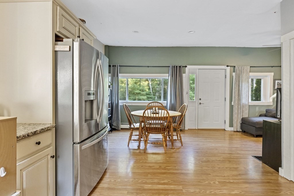 8 Squirrel Road Plymouth, MA 02360 - Photo 9 of 42 a living room with furniture and a table