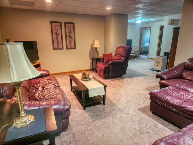 a living room with furniture and a couch