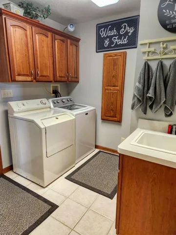 a utility room with washer and dryer