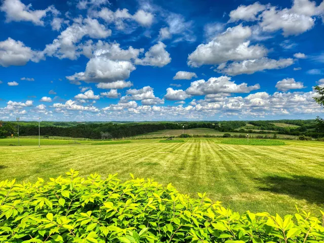 a view of swimming pool with outdoor seating