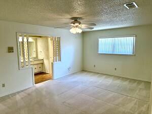 3206 77th Street Lubbock, TX 79423 - Photo 15 of 35 a view of an empty room with a window