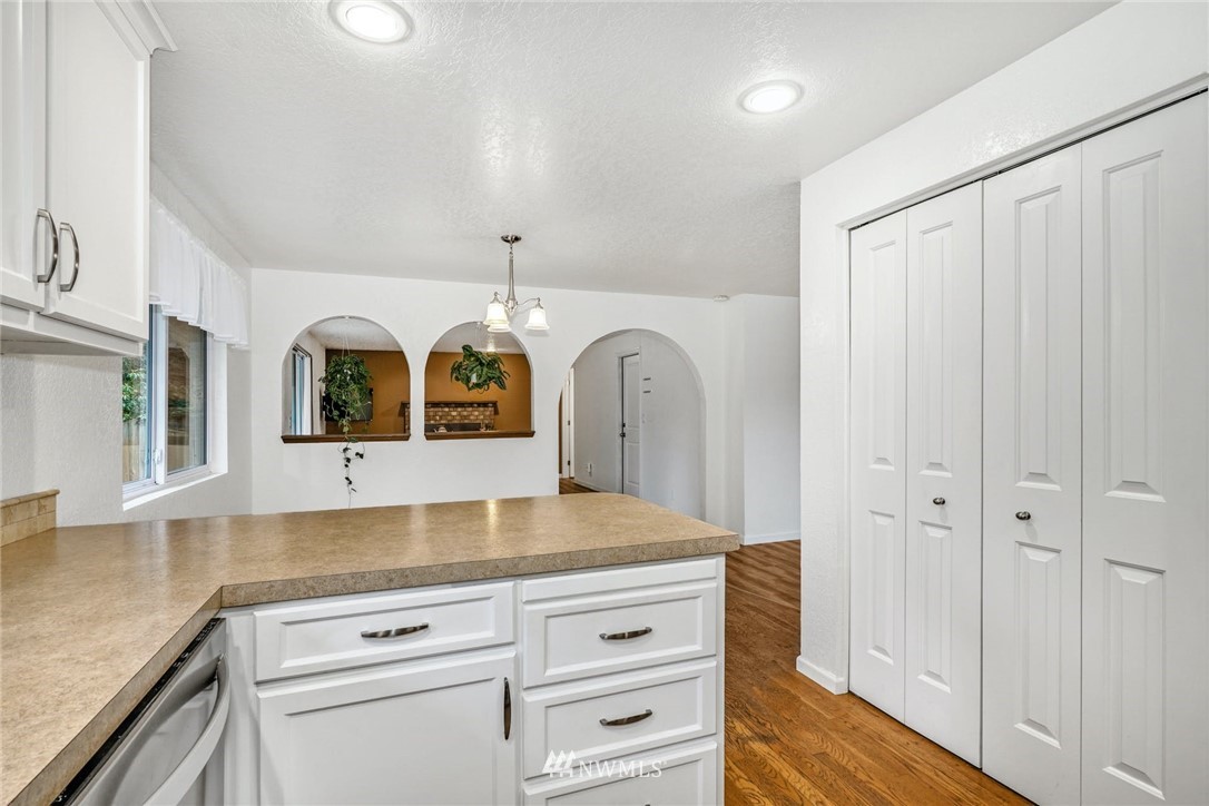 17409 29th Drive Southeast Bothell, WA 98012 - Photo 11 of 37 a bathroom with a granite countertop sink and a mirror