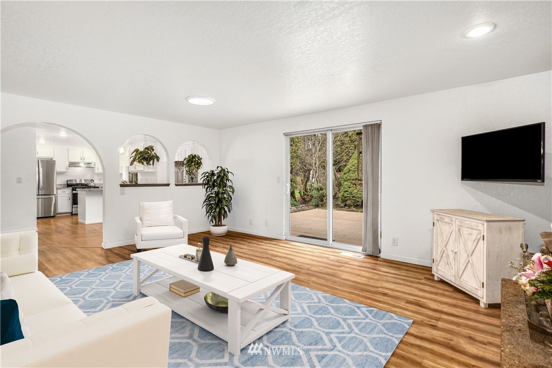 17409 29th Drive Southeast Bothell, WA 98012 - Photo 14 of 37 a living room with furniture and a flat screen tv