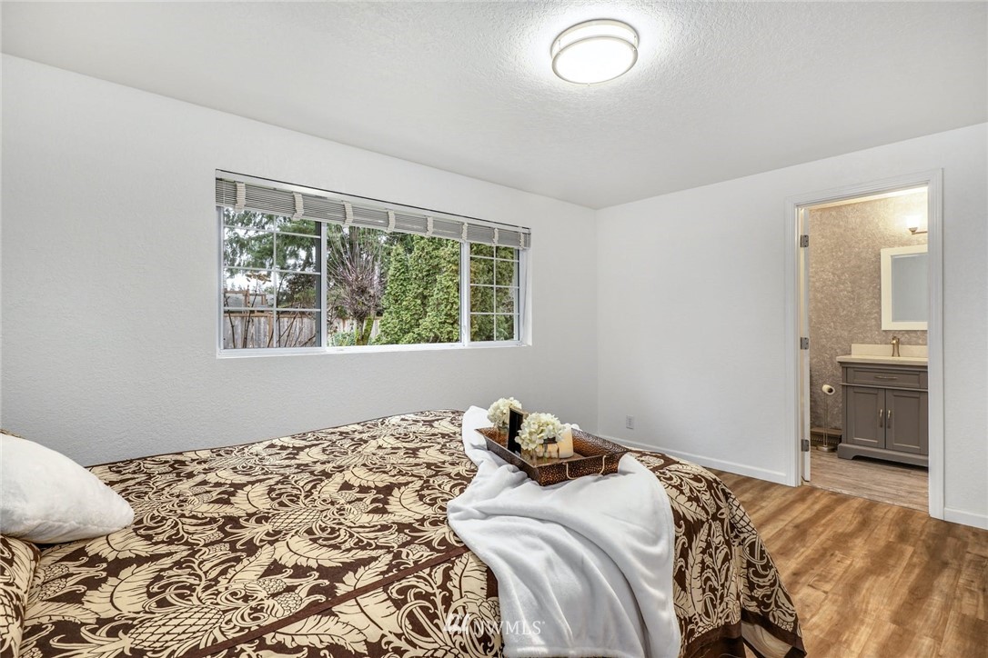 17409 29th Drive Southeast Bothell, WA 98012 - Photo 17 of 37 a bedroom with a bed and a window