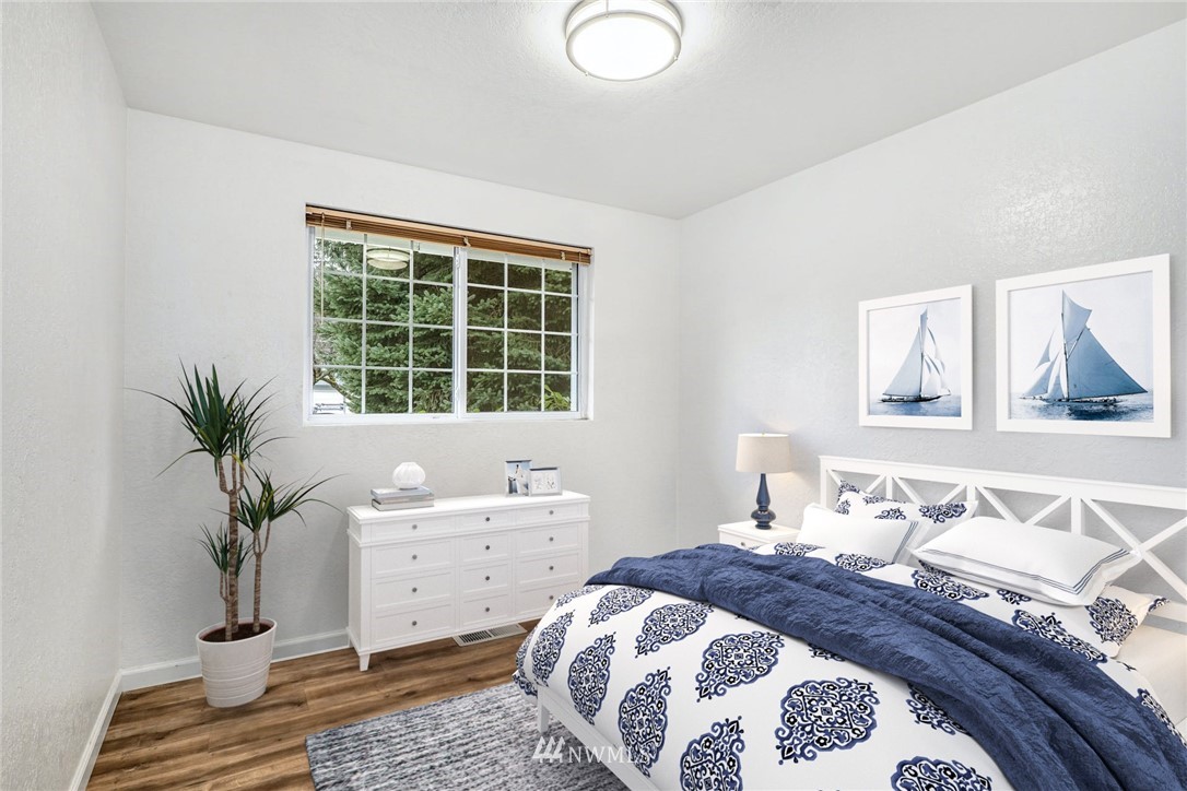 17409 29th Drive Southeast Bothell, WA 98012 - Photo 20 of 37 a bedroom with a bed and a window