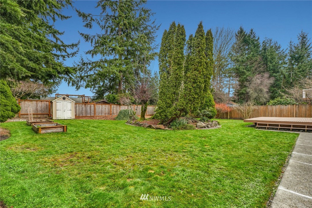 17409 29th Drive Southeast Bothell, WA 98012 - Photo 25 of 37 a view of a backyard with a garden