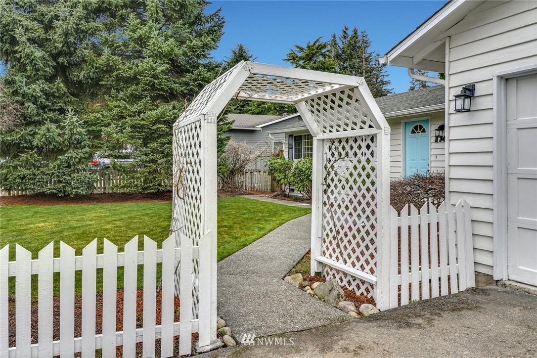 17409 29th Drive Southeast Bothell, WA 98012 - Photo 27 of 37 a front view of a house with garden