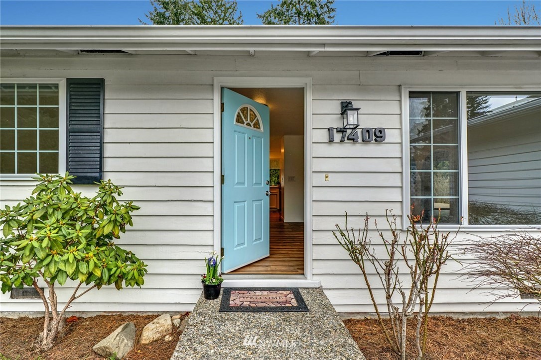 17409 29th Drive Southeast Bothell, WA 98012 - Photo 5 of 37 a front view of a house with a yard