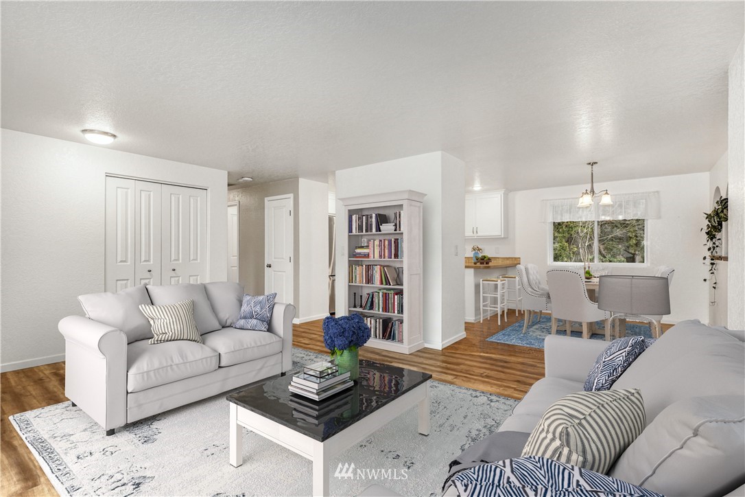 17409 29th Drive Southeast Bothell, WA 98012 - Photo 7 of 37 a living room with furniture and a table