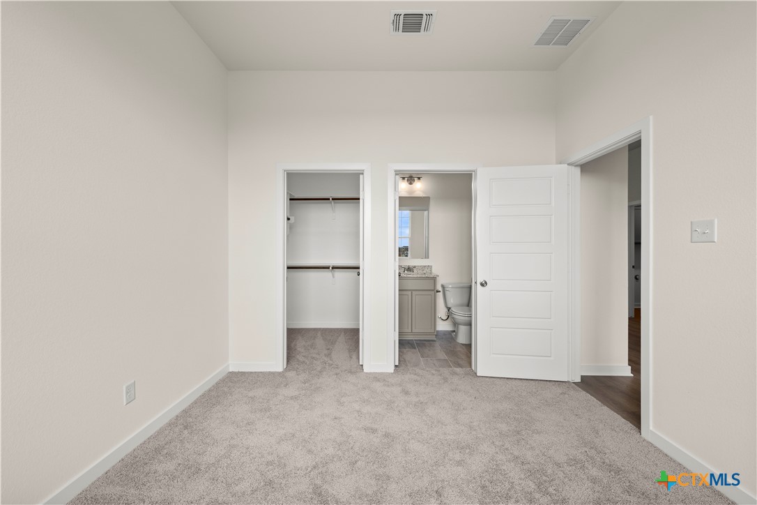 5102 Pollack Lane Belton, TX 76513 - Photo 8 of 30 an empty room with a kitchen