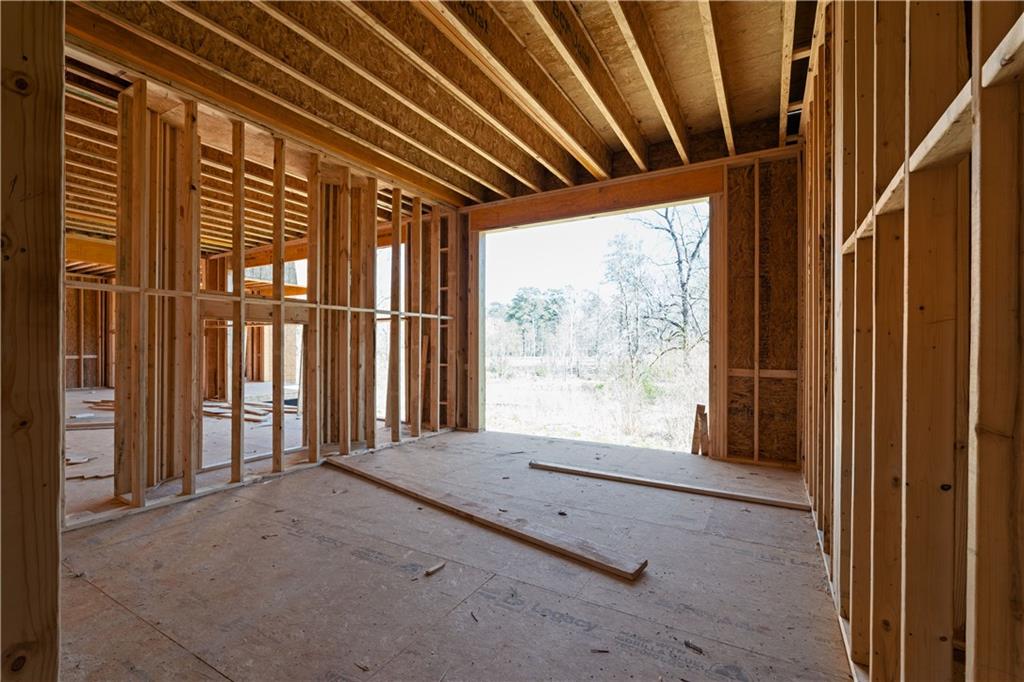 4957 Peachtree Dunwoody Road Sandy Springs, GA 30342 - Photo 26 of 54 a view of an empty room with a window