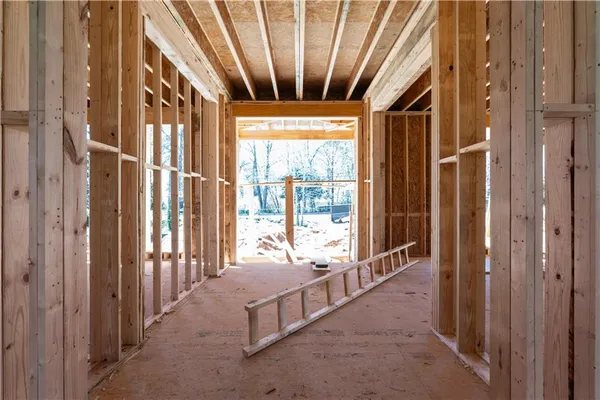 a view of porch with wooden floor