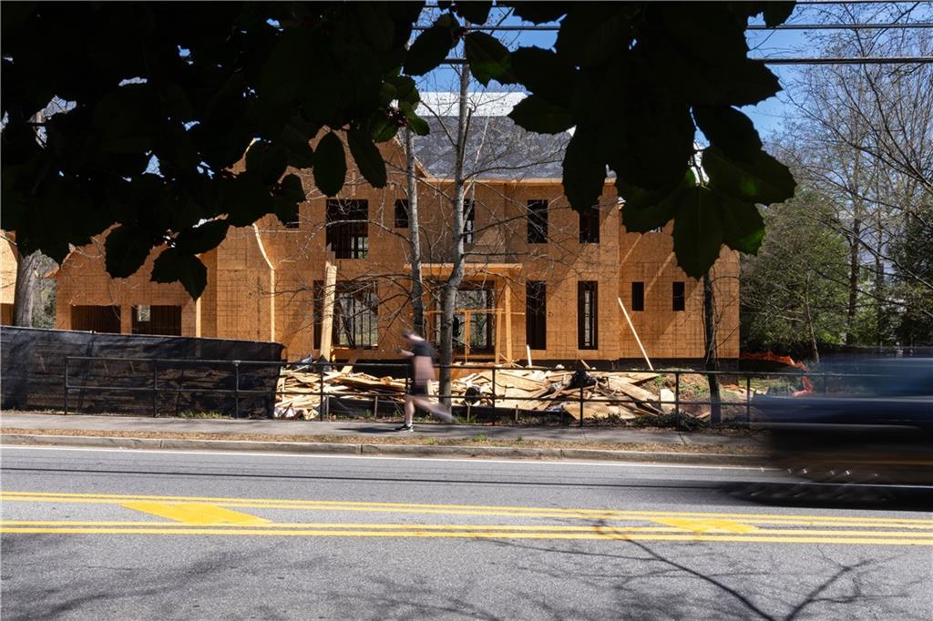 4957 Peachtree Dunwoody Road Sandy Springs, GA 30342 - Photo 48 of 54 a view of building with street view