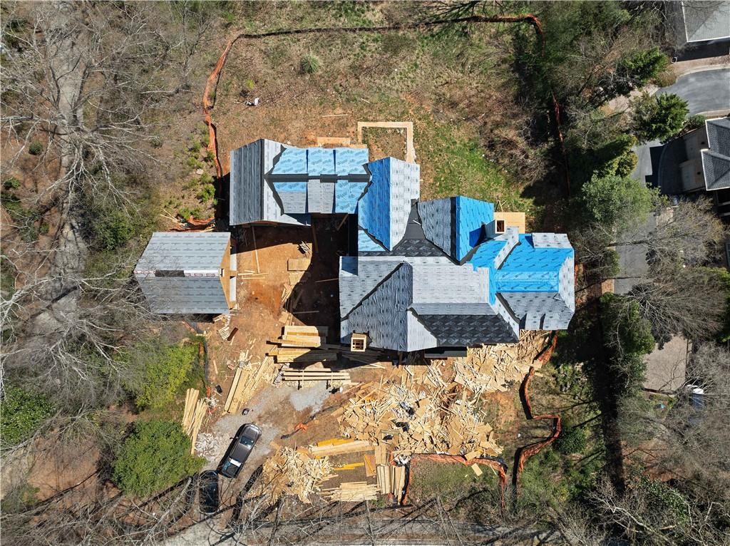 4957 Peachtree Dunwoody Road Sandy Springs, GA 30342 - Photo 9 of 54 an aerial view of a house with outdoor space