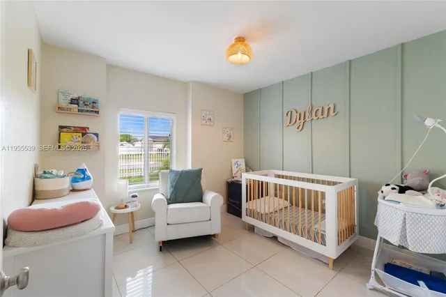 a bedroom with furniture and windows