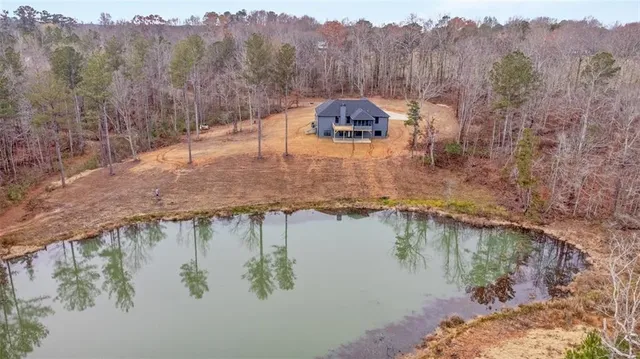 a view of a lake with a mountain in the background